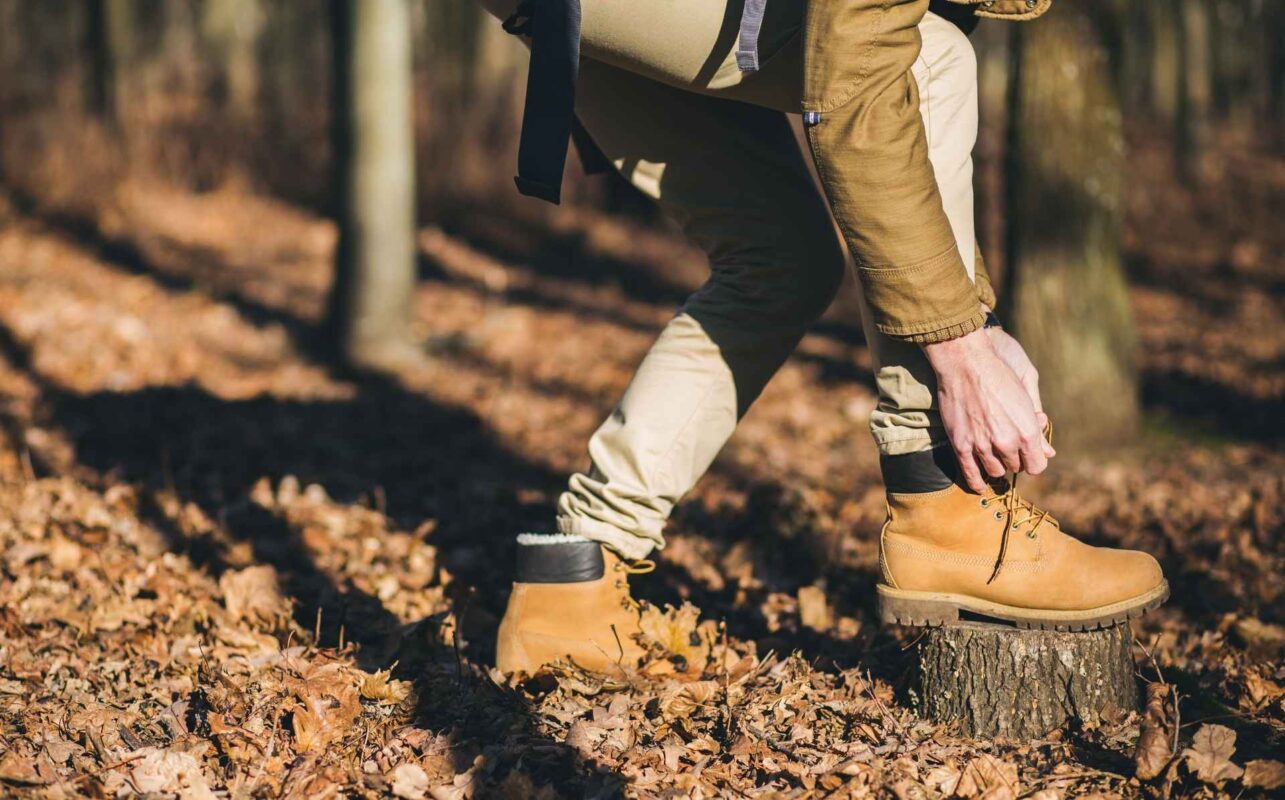Man In Woods Wearing Comfortable Work Boots That Are Timberlands