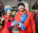 Couple Trying on Winter Work Gear